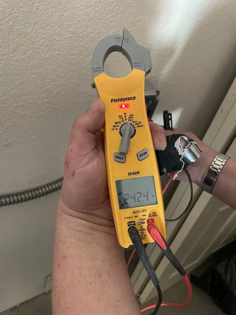 Voltage testing with clamp meter during Ceiling Fan Installation in Cotati